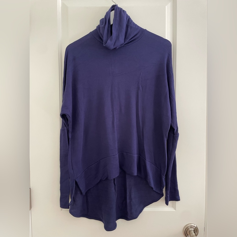 Purple turtleneck sweater